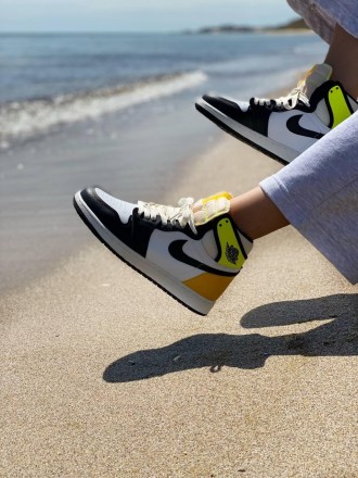 Кроссовки женские черно-белые Nike Air Jordan 1 High OG “Volt Gold” 
Отличные же. . фото 9