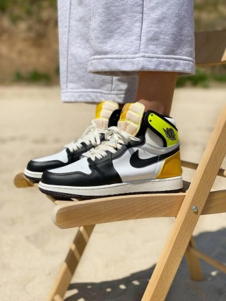 Кроссовки женские черно-белые Nike Air Jordan 1 High OG “Volt Gold” 
Отличные же. . фото 2