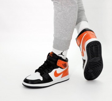 Кроссовки женские оранжевые Jordan 1 High Orange White Black
Крутые женские крос. . фото 6