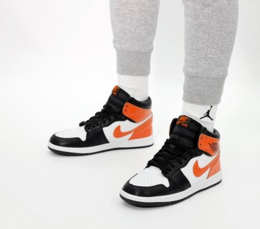 Кроссовки женские оранжевые Jordan 1 High Orange White Black
Крутые женские крос. . фото 5