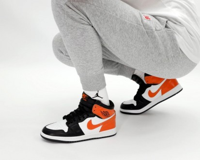 Кроссовки женские оранжевые Jordan 1 High Orange White Black
Крутые женские крос. . фото 11