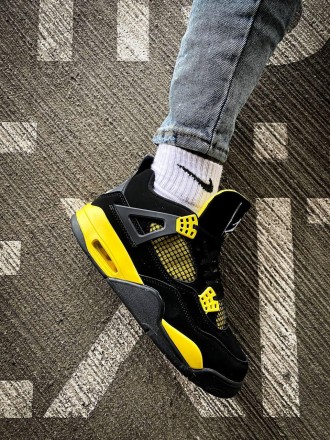 Кроссовки мужские черные Jordan 4 Retro "Thunder" Black Yellow
Черные мужские сп. . фото 5
