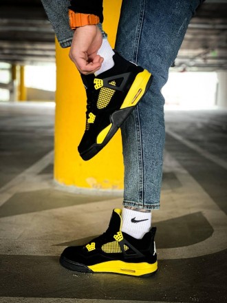 Кроссовки мужские черные Jordan 4 Retro "Thunder" Black Yellow
Черные мужские сп. . фото 4