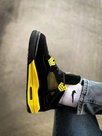 Кроссовки мужские черные Jordan 4 Retro "Thunder" Black Yellow
Черные мужские сп. . фото 3