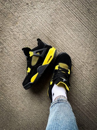 Кроссовки мужские черные Jordan 4 Retro "Thunder" Black Yellow
Черные мужские сп. . фото 9