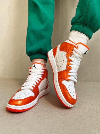 Кроссовки женские белые Jordan 1 Mid Electro Orange
Стильные высокие женские кро. . фото 7