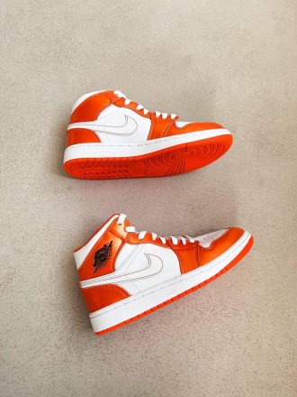 Кроссовки женские белые Jordan 1 Mid Electro Orange
Стильные высокие женские кро. . фото 9