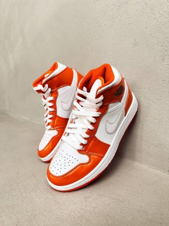 Кроссовки женские белые Jordan 1 Mid Electro Orange
Стильные высокие женские кро. . фото 2