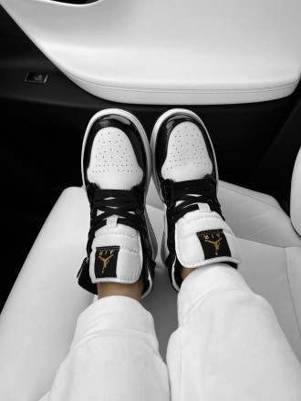 Кроссовки женские черно-белые Jordan Retro 1 Black Gold Patent
Встречайте потряс. . фото 5