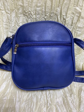 Спортивна мини сумка ( клатч) через плече,
Матеріал: кожзам
Розмір: ширина 18 см. . фото 4