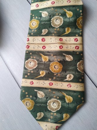 Чоловічий шовковий галстук

Вся довжина галстука 148 см
100 % silk
Made in I. . фото 5