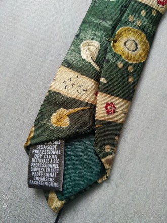 Чоловічий шовковий галстук

Вся довжина галстука 148 см
100 % silk
Made in I. . фото 4