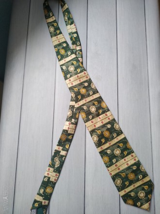 Чоловічий шовковий галстук

Вся довжина галстука 148 см
100 % silk
Made in I. . фото 2
