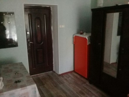 Продам  комнату в коммуне 16,1 м² с ремонтом - расположена на 2-м этаже 5-т. Киевский. фото 3