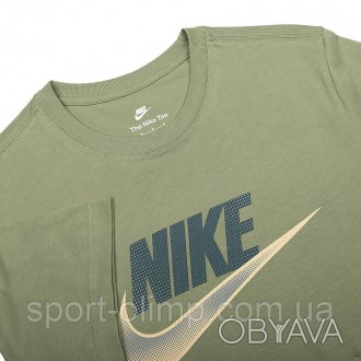 Футболка Nike — це ідеальний вибір для тих, хто шукає комфорт і зручність. Вона . . фото 1