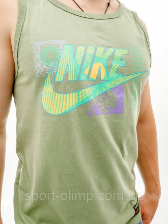 Майка Nike - это стильная и функциональная одежда, созданная для тех, кто ценит . . фото 3