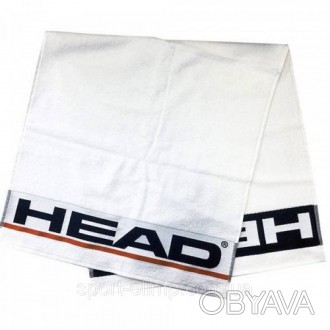 Рушник маленького розміру білого кольору з жовтим логотипом посередині 'HEAD'. З. . фото 1