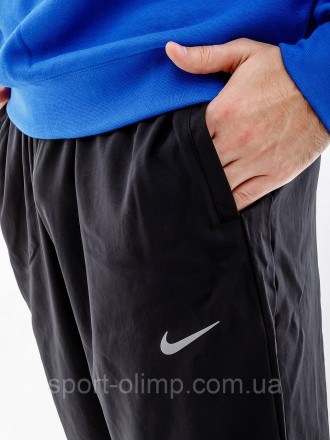 Брюки Nike CHLLGR WVN PANT Элегантный и технически продуманный выбор от признанн. . фото 4
