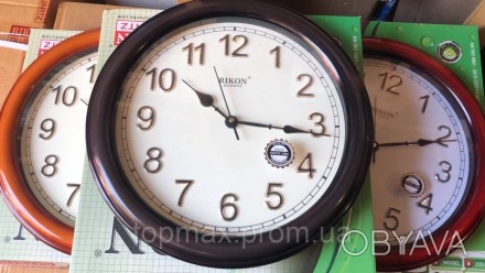 
Часы настенные Rikon 8351 DX 36см
Характеристики:
	цвета: коричневый, оранжевый. . фото 1