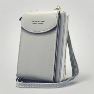 
Жіночий гаманець портмоне Baellerry Forever
Дуже красивий гаманець клатч, який . . фото 2