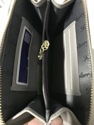 
Жіночий гаманець портмоне Baellerry Forever
Дуже красивий гаманець клатч, який . . фото 10