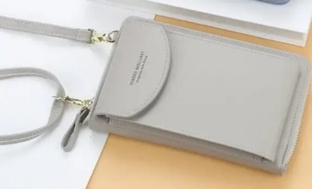 
Жіночий гаманець портмоне Baellerry Forever
Дуже красивий гаманець клатч, який . . фото 8