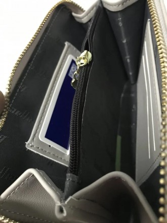 
Жіночий гаманець портмоне Baellerry Forever
Дуже красивий гаманець клатч, який . . фото 9