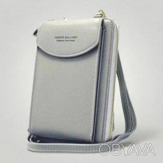 
Жіночий гаманець портмоне Baellerry Forever
Дуже красивий гаманець клатч, який . . фото 1