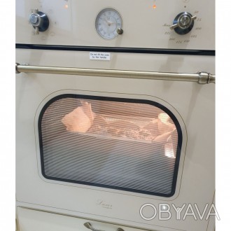 Классическая бежевая встраиваемая духовка с медной фурнитурой в стиле RETRO
Объе. . фото 1