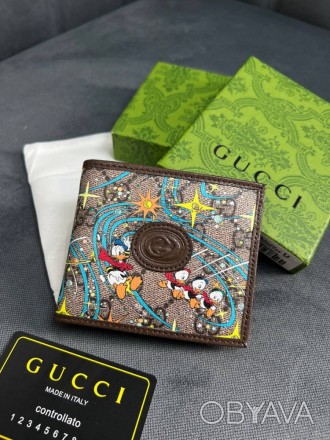 
 
 Бумажник Gucci x Disney GG Supreme Donald Duck Web logo 
Цвет : кориневый
Пр. . фото 1