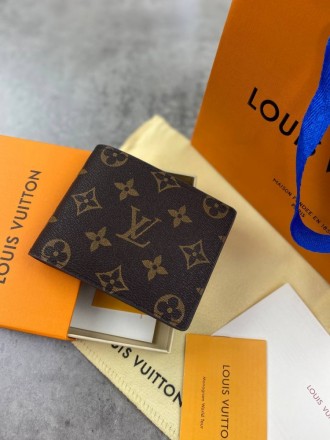 
 
 Бумажник Louis Vuitton Monogram
Материал : канвас+кожа
Цвет : коричневый
Про. . фото 2