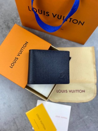 
 
 Бумажник Louis Vuitton taiga
Материал : канвас+кожа
Цвет : черный
Производит. . фото 2