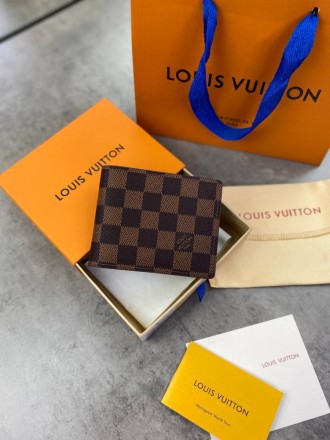 
 
 Бумажник Louis Vuitton Monogram
Материал : канвас+кожа
Цвет : коричневый
Про. . фото 2