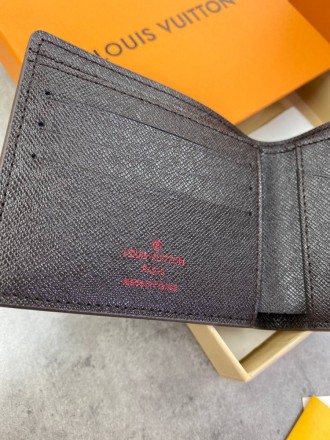 
 
 Бумажник Louis Vuitton Monogram
Материал : канвас+кожа
Цвет : коричневый
Про. . фото 4
