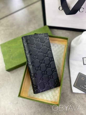 
 
 Бумажник Gucci GG
Цвет : черный
Материал : канвас+кожа
Производитель : Китай. . фото 1