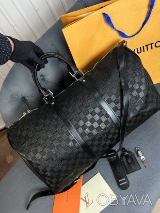 
 
 Дорожная черная сумка Louis Vuitton в стиле "Infini"
Цвет : черный
Размер : . . фото 1