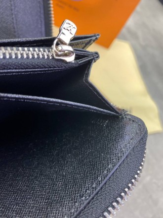 
 
 Бумажник Louis Vuitton 
Цвет : серый
Материал : канвас+кожа
Производитель : . . фото 3