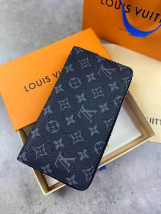 
 
 Бумажник Louis Vuitton 
Цвет : серый
Материал : канвас+кожа
Производитель : . . фото 7