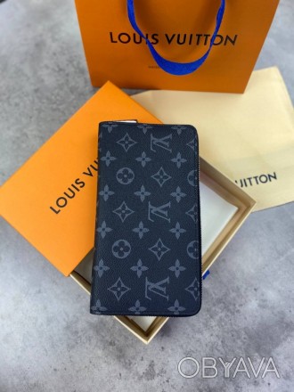 
 
 Бумажник Louis Vuitton 
Цвет : серый
Материал : канвас+кожа
Производитель : . . фото 1