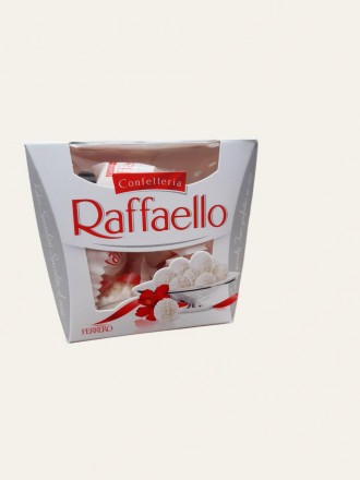 Набір цукерок Raffaello в картонній упаковці.
Вага: 150 грам
Виробник: Польща. . фото 2