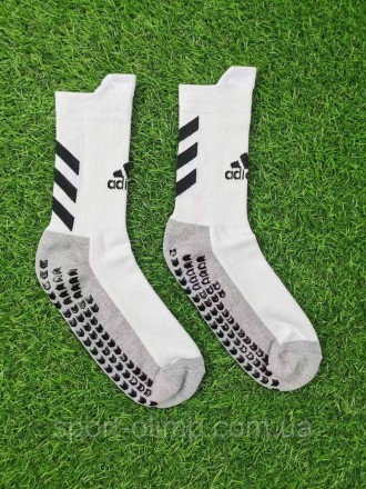 Тренувальні шкарпетки Adidas
Призначені для активних видів спорту, на стопі силі. . фото 2