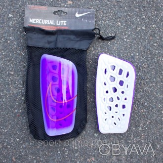 Футбольні щитки Nike Mercurial Lite
Футбольні щитки забезпечать безпеку і максим. . фото 1