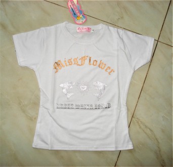Яркая, стильная и качественная футболка из мягкого трикотажа с принтом для девоч. . фото 10