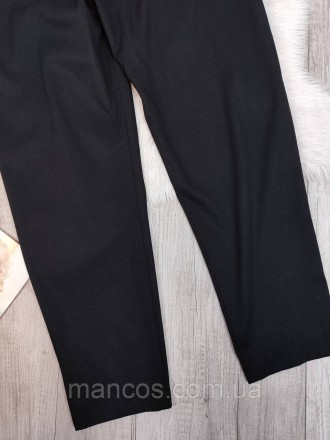 Придайте своему образу элегантности и стиля с этими черными классическими брюкам. . фото 9