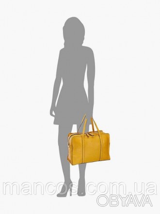 Изысканная кожаная жёлтая сумка придаст вашему образу свежий и стильный вид. Она. . фото 1