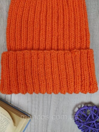 Теплая зимняя шапка в ярком оранжевом цвете станет отличным акцентом вашего зимн. . фото 4