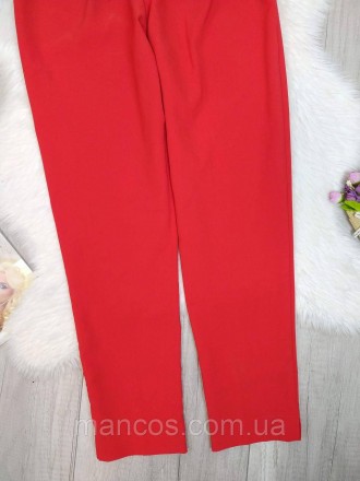 Женские красные брюки б/у. Сзади пояс серебристого цвета. Имеются два кармана сз. . фото 4