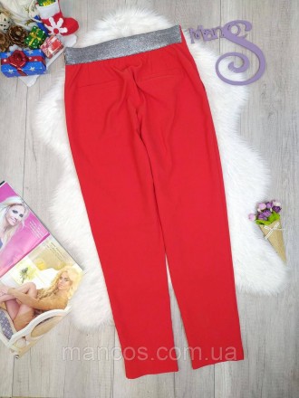 Женские красные брюки б/у. Сзади пояс серебристого цвета. Имеются два кармана сз. . фото 5
