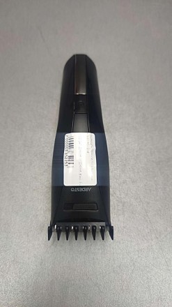 Компактная машинка черного цвета для стрижки волос со встроенным аккумулятором A. . фото 9