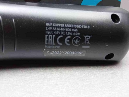 Компактная машинка черного цвета для стрижки волос со встроенным аккумулятором A. . фото 3